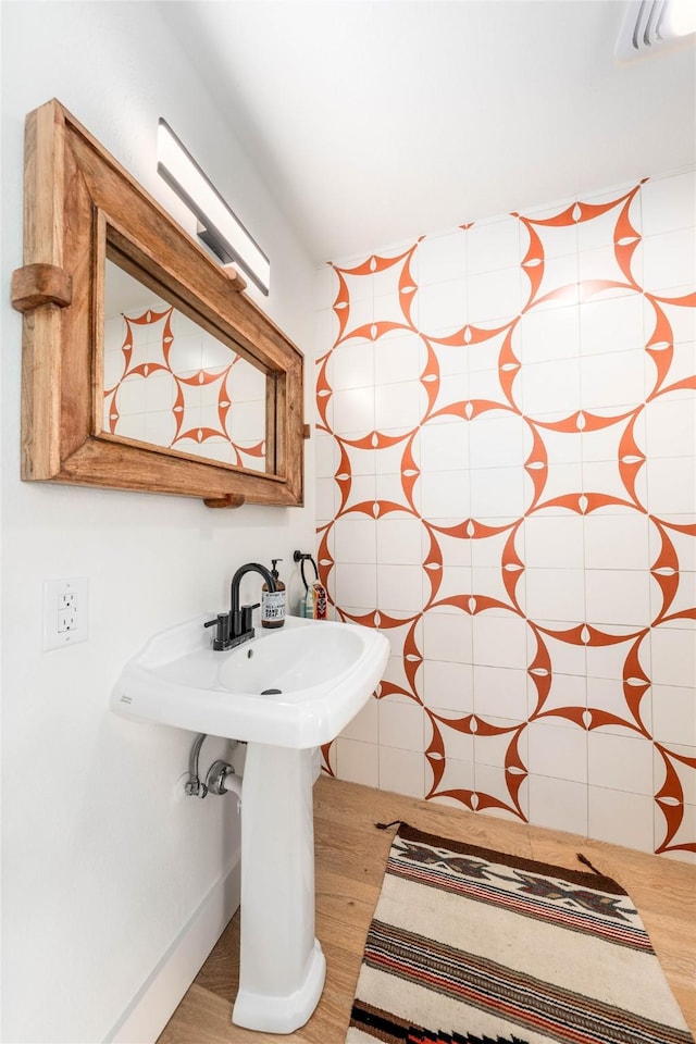 bathroom with wood finished floors
