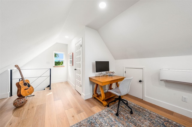 office space featuring lofted ceiling, wood finished floors, recessed lighting, and baseboards