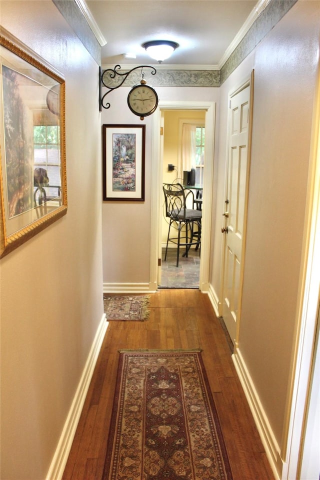 423 S O Connor Rd, Irving, TX 75060 - corridor with baseboards, ornamental molding, and dark wood-style floors