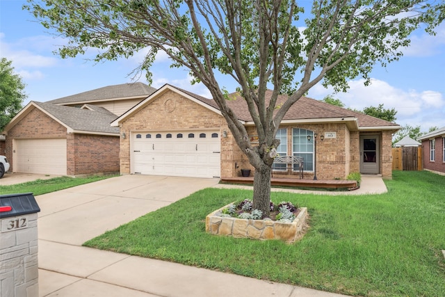 ranch-style house with driveway, a front yard, roof with shingles, brick siding, and an attached garage