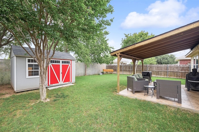 view of yard with an outdoor living space, an outbuilding, a fenced backyard, a shed, and a patio