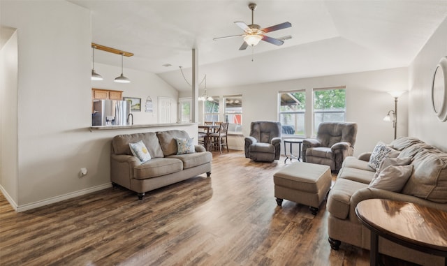 living room with visible vents, lofted ceiling, baseboards, dark wood-type flooring, and a ceiling fan