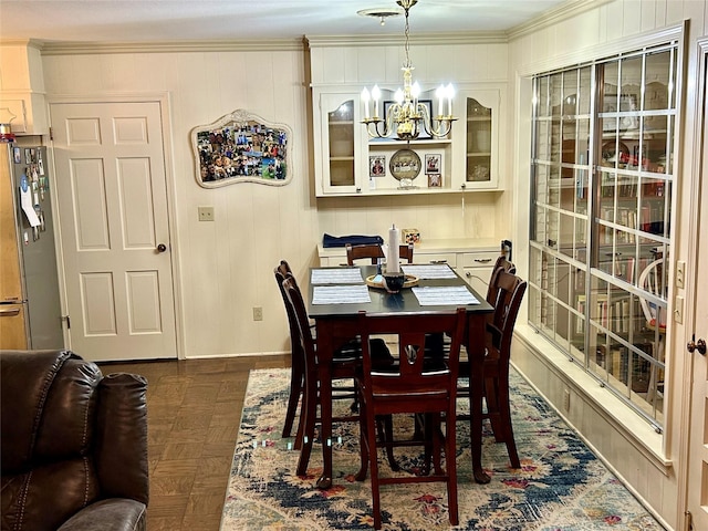 6114 Verona Ln, Shreveport, LA 71105 - dining area featuring a chandelier and crown molding