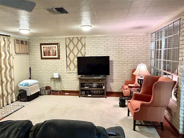 6114 Verona Ln, Shreveport, LA 71105 - living area with a wall mounted air conditioner, ornamental molding, brick wall, and carpet flooring