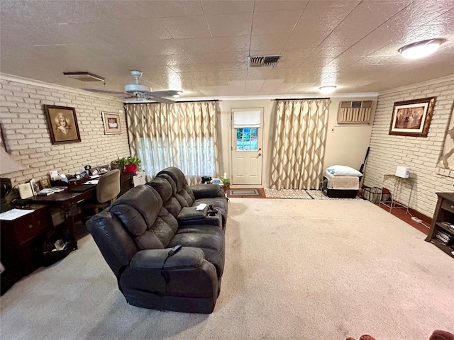 6114 Verona Ln, Shreveport, LA 71105 - living room featuring brick wall, carpet flooring, a wall mounted AC, a ceiling fan, and crown molding