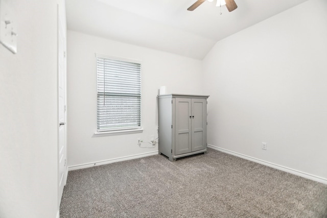247 Carolina Trce, Fate, TX 75189 - carpeted spare room with ceiling fan, baseboards, and lofted ceiling