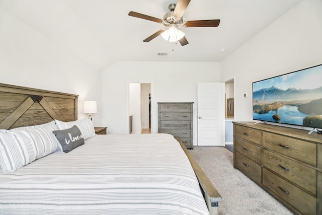 bedroom featuring a ceiling fan, light colored carpet, and visible vents