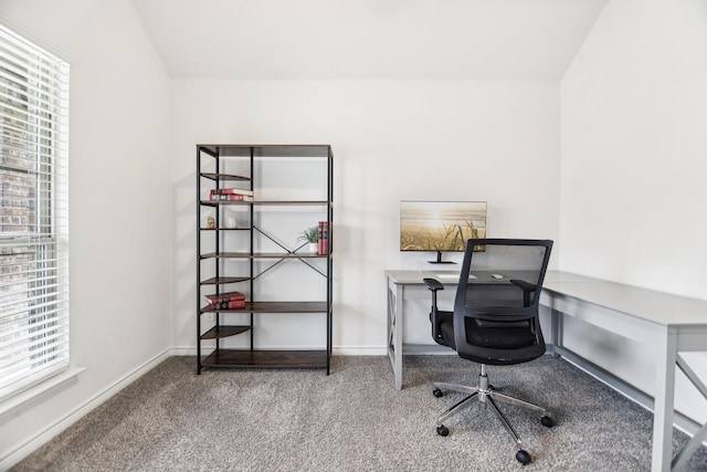home office with baseboards and carpet
