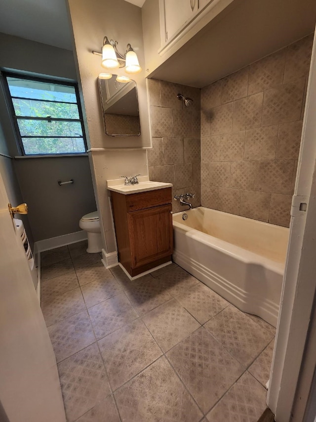 full bath featuring toilet, vanity, shower / bath combination, and tile patterned floors