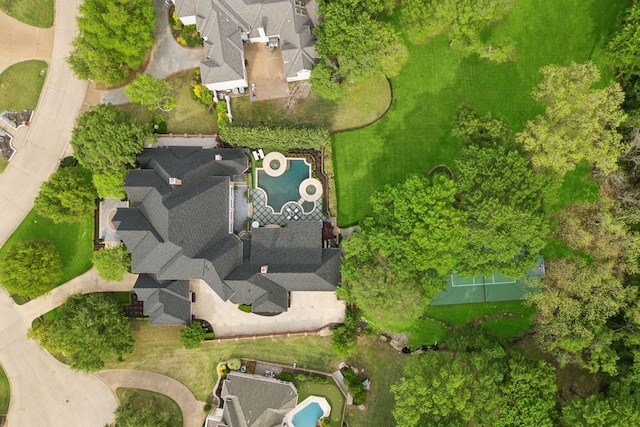 birds eye view of property with a residential view
