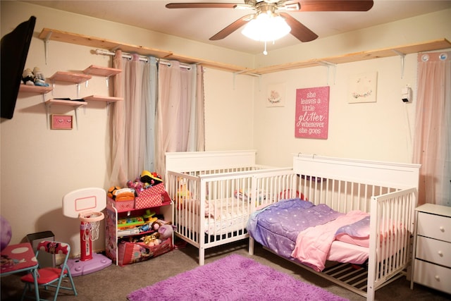 carpeted bedroom with a ceiling fan