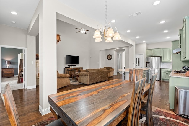 dining area with visible vents, recessed lighting, dark wood-style flooring, and a chandelier