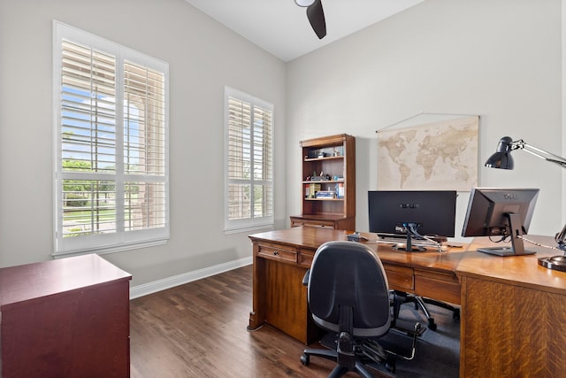 office area featuring baseboards, a ceiling fan, and dark wood-style flooring