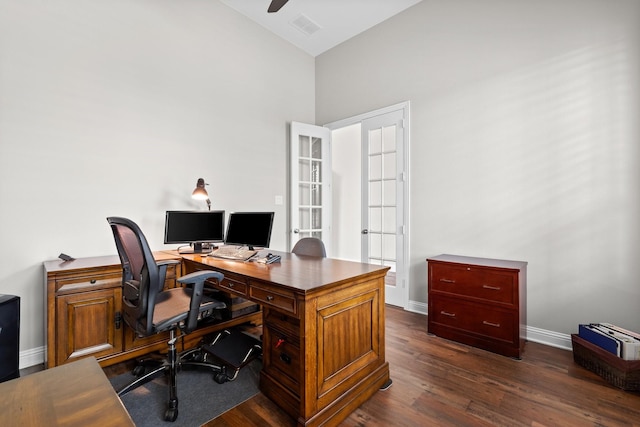 office space featuring visible vents, baseboards, ceiling fan, dark wood-type flooring, and french doors