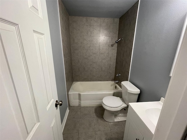 full bath featuring tile patterned floors, vanity, toilet, and bathing tub / shower combination