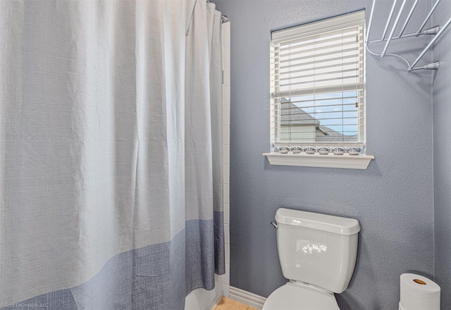 794 Amherst Dr, Rockwall, TX 75087 - bathroom featuring toilet and curtained shower