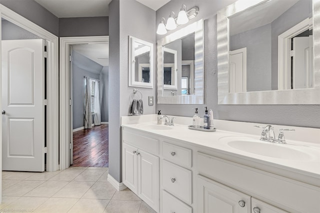 794 Amherst Dr, Rockwall, TX 75087 - full bath with tile patterned flooring and double vanity