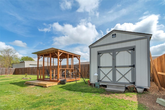 view of shed with a gazebo and a fenced backyard