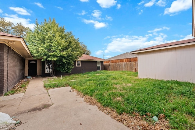 view of yard featuring fence