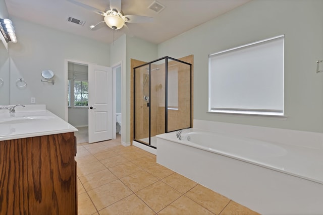 9405 National Pines Dr, Mckinney, TX 75072 - full bathroom featuring visible vents, a sink, tile patterned floors, and a shower stall