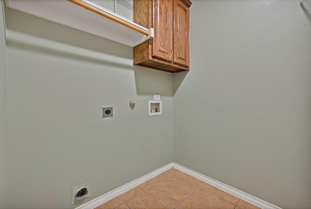 9405 National Pines Dr, Mckinney, TX 75072 - laundry area featuring washer hookup, electric dryer hookup, hookup for a gas dryer, light tile patterned floors, and baseboards
