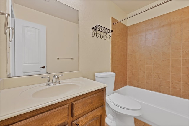 9405 National Pines Dr, Mckinney, TX 75072 - bathroom featuring vanity, bathtub / shower combination, and toilet