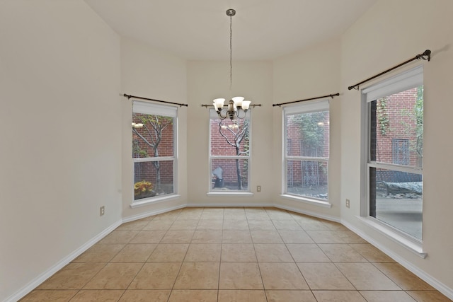 9405 National Pines Dr, Mckinney, TX 75072 - unfurnished dining area featuring baseboards, light tile patterned floors, and a chandelier