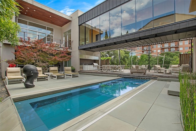 outdoor pool with a patio