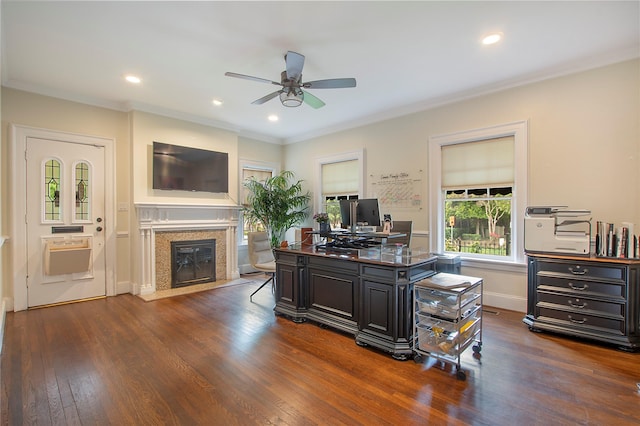 office area with a fireplace with flush hearth, dark wood-type flooring, ceiling fan, and crown molding