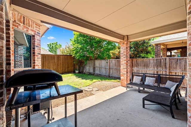 view of patio with a fenced backyard