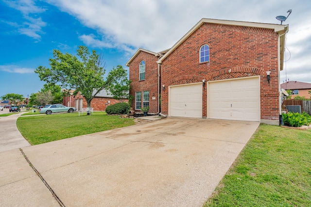 view of side of property with brick siding, fence, a garage, driveway, and a lawn