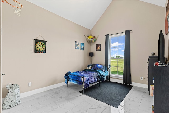 bedroom with baseboards, high vaulted ceiling, and marble finish floor