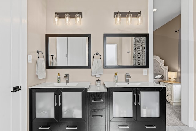 bathroom with two vanities and a sink