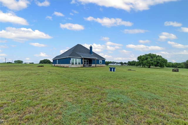 view of yard with a rural view