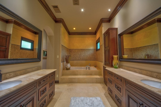 9 Victory Ln, Double Oak, TX 75077 - full bath featuring crown molding, a bath, two vanities, tile patterned floors, and recessed lighting
