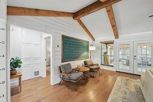 bedroom featuring visible vents, a closet, wood finished floors, baseboards, and ceiling fan