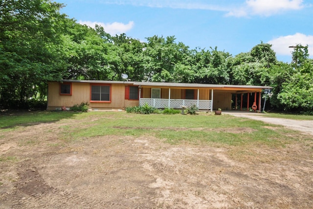 3412 Tin Top Rd, Weatherford, TX 76087 - view of front of house featuring dirt driveway and an attached carport