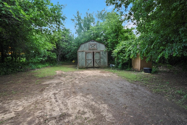 3412 Tin Top Rd, Weatherford, TX 76087 - view of yard with an outbuilding, a storage shed, and a barn