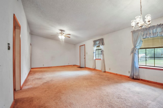 3412 Tin Top Rd, Weatherford, TX 76087 - spare room featuring healthy amount of natural light, a chandelier, carpet flooring, baseboards, and a textured ceiling