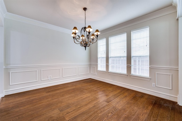 4465 Mira Vista Dr, Frisco, TX 75034 - unfurnished room featuring dark wood-style flooring, a chandelier, plenty of natural light, crown molding, and a wainscoted wall
