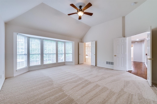 4465 Mira Vista Dr, Frisco, TX 75034 - unfurnished bedroom with carpet flooring, high vaulted ceiling, baseboards, ceiling fan, and connected bathroom