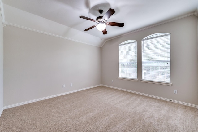 4465 Mira Vista Dr, Frisco, TX 75034 - empty room featuring ornamental molding, light colored carpet, ceiling fan, vaulted ceiling, and baseboards