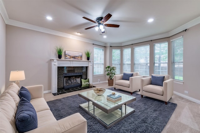 4465 Mira Vista Dr, Frisco, TX 75034 - living room with a ceiling fan, carpet, a tile fireplace, ornamental molding, and healthy amount of natural light