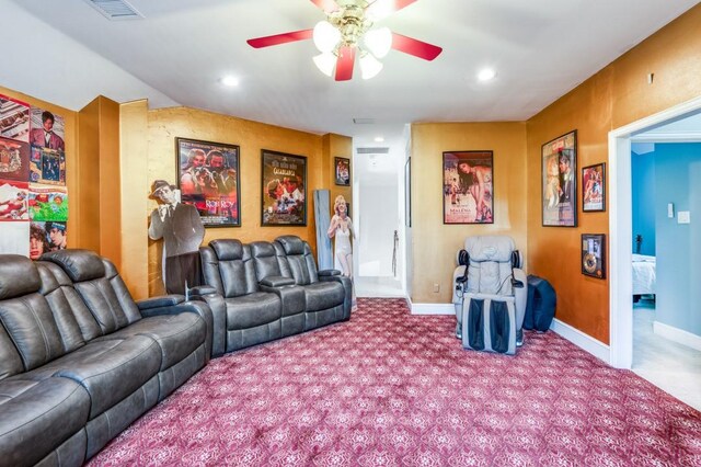 carpeted living room with baseboards, recessed lighting, ceiling fan, and visible vents