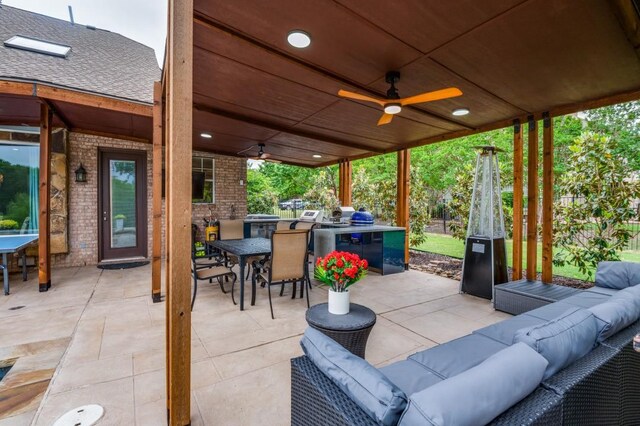 view of patio / terrace featuring a ceiling fan, outdoor dining space, area for grilling, and outdoor lounge area