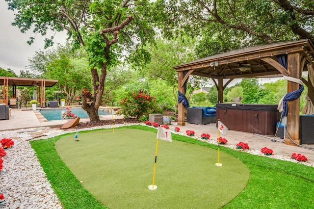 view of property's community with a gazebo, a patio, a jacuzzi, and a pool