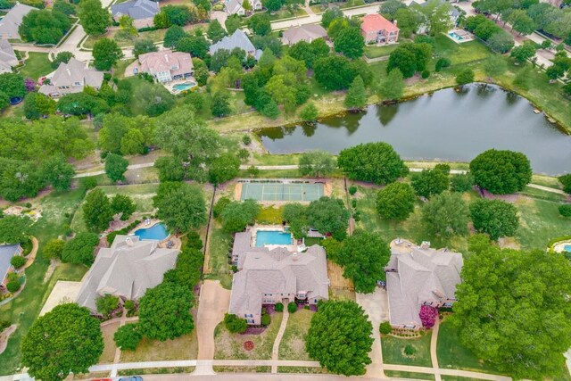 bird's eye view featuring a residential view and a water view