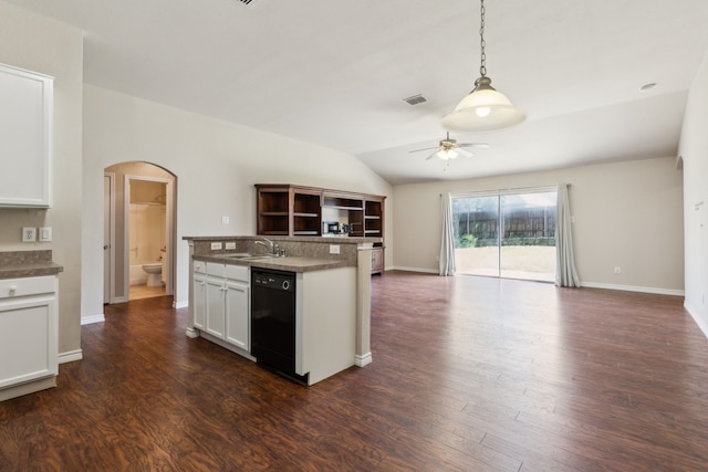 kitchen featuring lofted ceiling, arched walkways, open floor plan, black dishwasher, and a ceiling fan