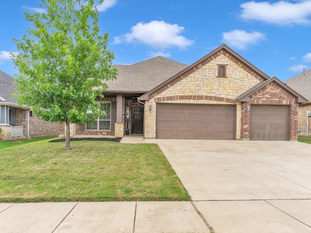 view of front facade featuring an attached garage, driveway, a shingled roof, and a front lawn
