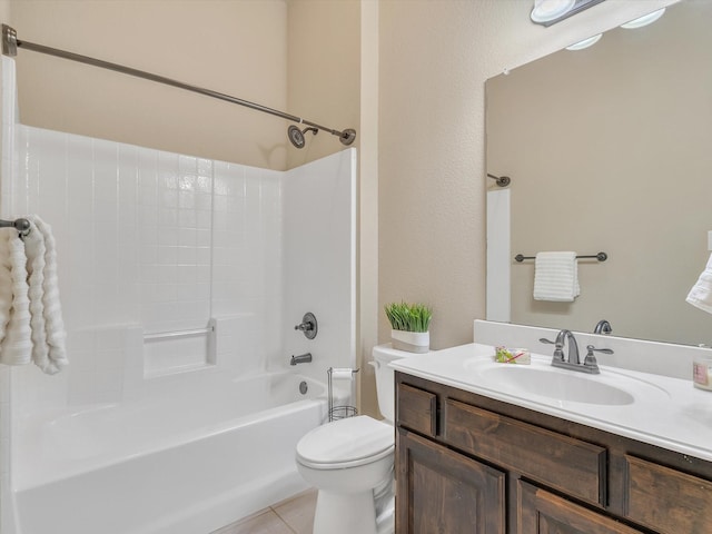 bathroom with vanity, shower / bathing tub combination, tile patterned flooring, and toilet